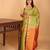 Dual tone green and dual tone orange small border kanchi pure silk saree