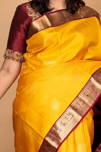 Yellow and maroon silk saree with blouse