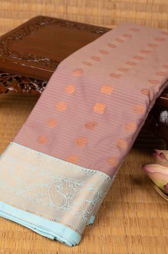 Dusky rose and ice blue semi silk saree