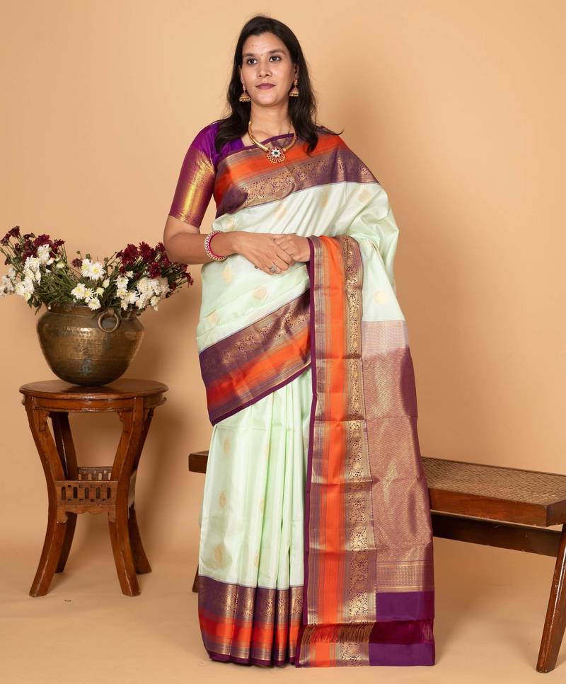 Pastel green and mulberry purple pure kanjivaram silk saree