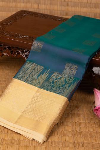 Peacock blue and off white pure touch silk saree