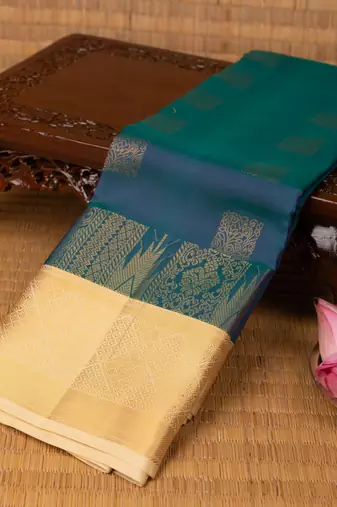 Peacock blue and off white pure touch silk saree