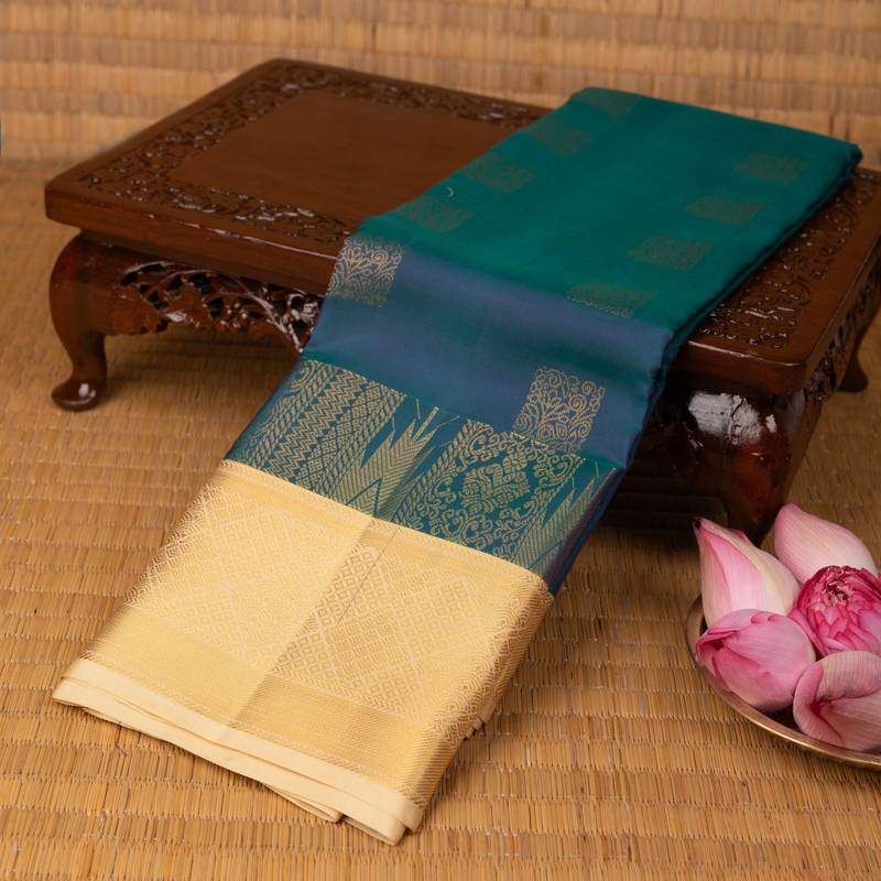 Peacock blue and off white pure touch silk saree