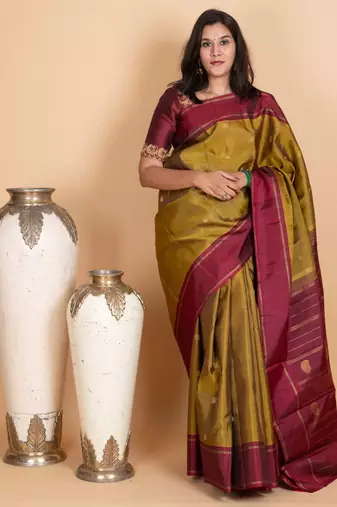 Golden moss green pure zari silk saree