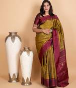 Golden moss green pure zari silk saree
