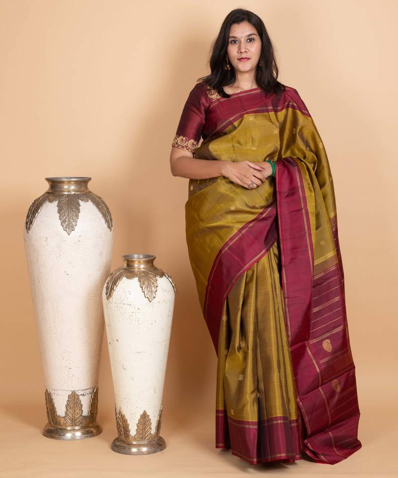 Golden moss green pure zari silk saree