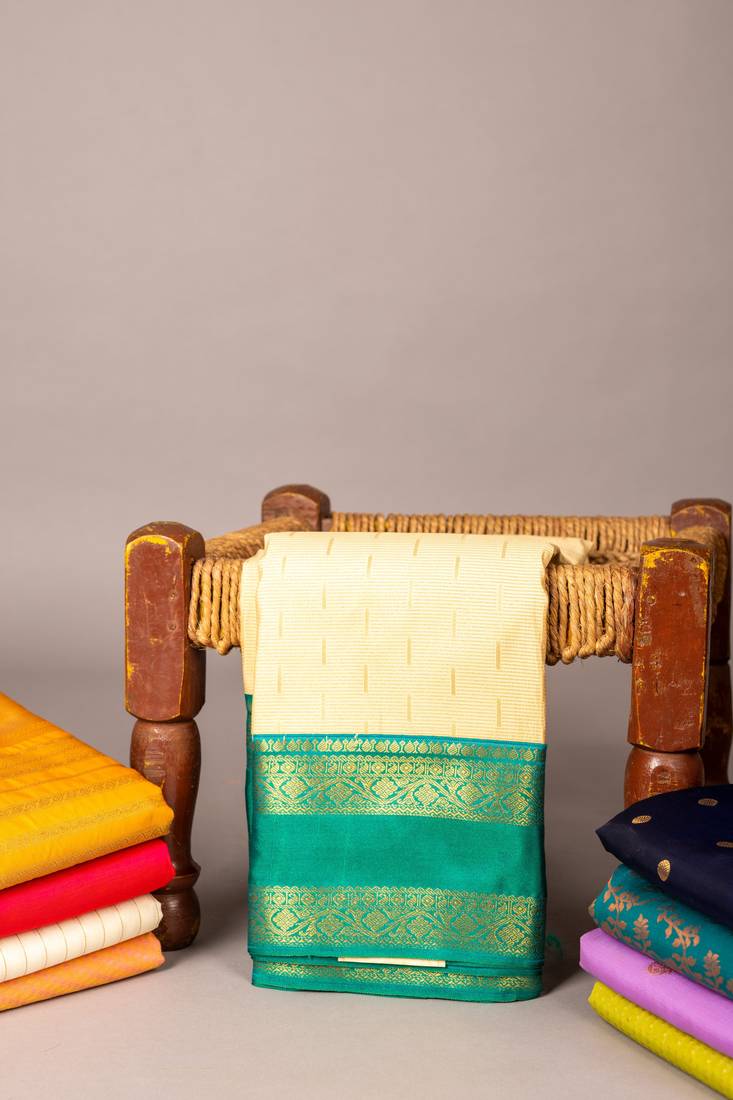 Off white teal semi silk saree