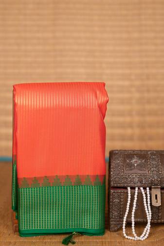 Neon orange and forest green brocade soft silk saree