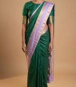 Pine green and pastel lavender retta patta border semi silk saree