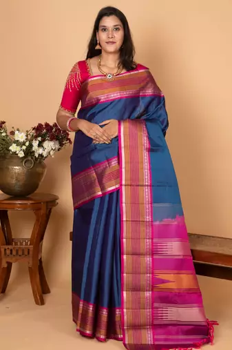 Peacock blue and wildberry pink zero zari kanjivaram silk saree