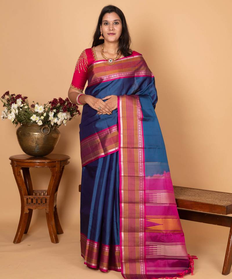 Peacock blue and wildberry pink zero zari kanjivaram silk saree