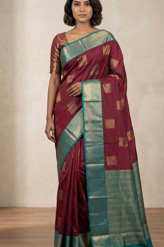Maroon teal green semi silk saree