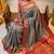 Ice grey and rani pink semi silk saree