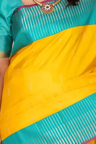 Bright yellow and turquoise blue kanchi silk saree with blouse