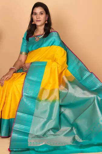 Bright yellow and turquoise blue kanchi silk saree with blouse