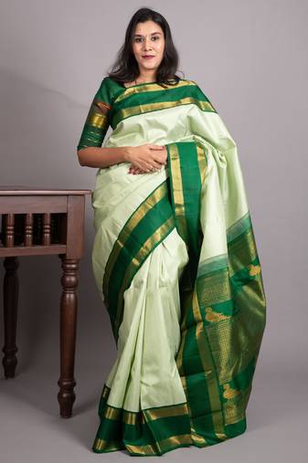 Mint green and forest green pure kanjivaram silk saree