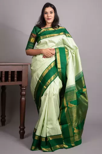 Mint green and forest green pure kanjivaram silk saree