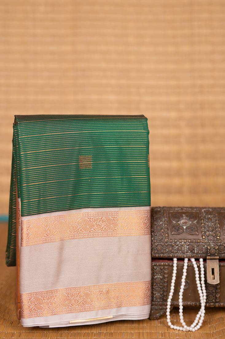 Forest green and cement grey retta patta border soft silk saree