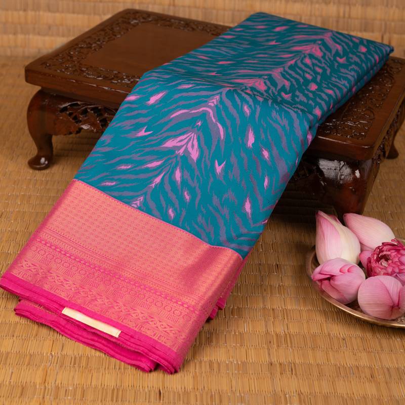 Peacock blue and bubblegum pink semi silk saree