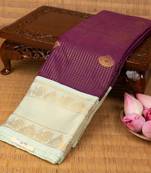 Purple and pastel green semi silk saree