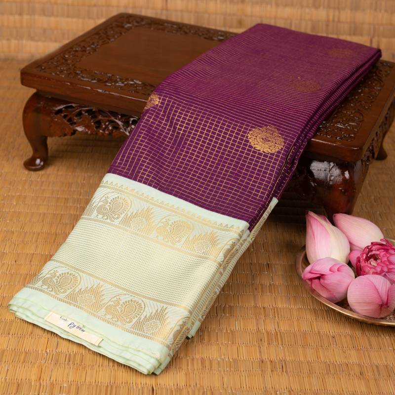 Purple and pastel green semi silk saree
