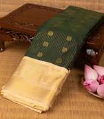 Bottle green and off white semi silk saree