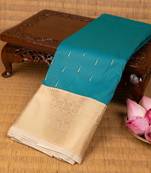 Deep sky blue and off white semi silk saree