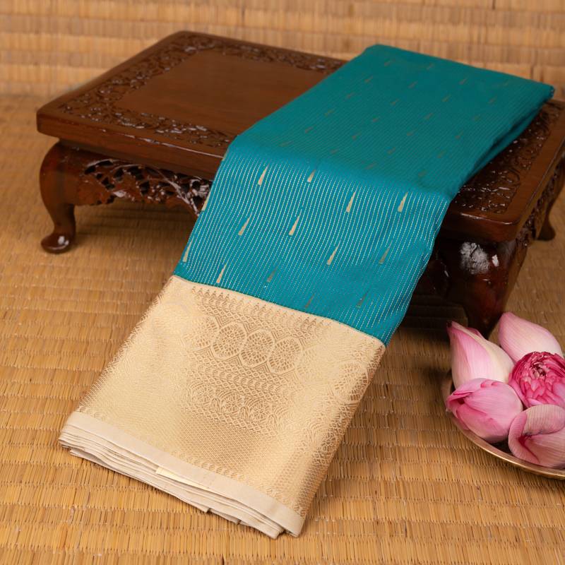 Deep sky blue and off white semi silk saree