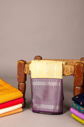 yellow and purple semi silk saree