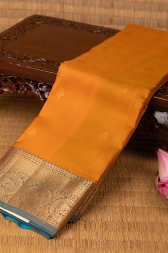 Turmeric yellow and dual tone blue pure touch silk saree