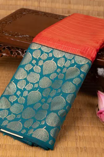 Red orange and teal green semi silk saree