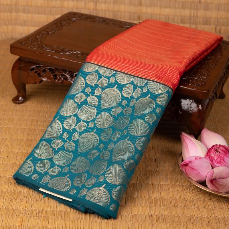 Red orange and teal green semi silk saree