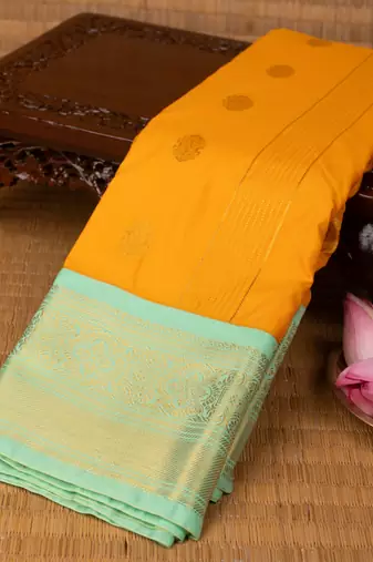 Mango yellow and mint green semi silk saree