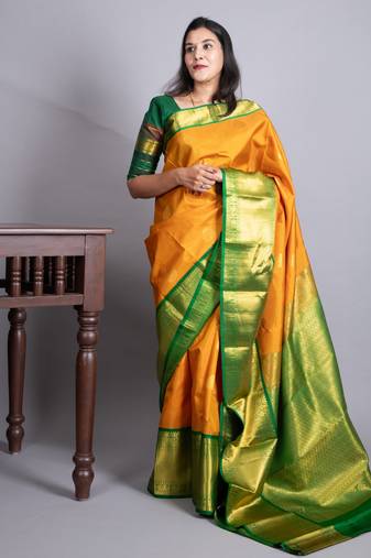 Turmeric yellow and forest green pure kanjivaram silk saree