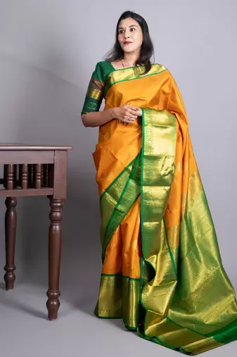 Turmeric yellow and forest green pure kanjivaram silk saree