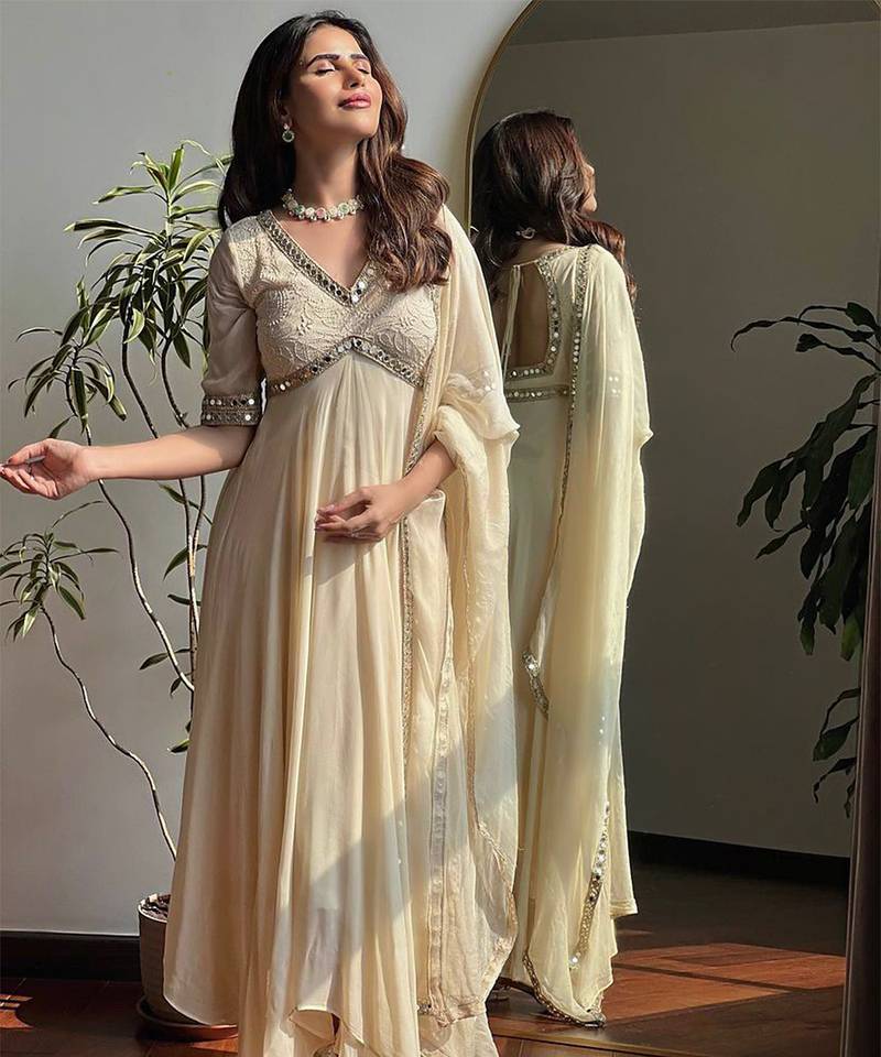 Cream mirror-work georgette Gown.