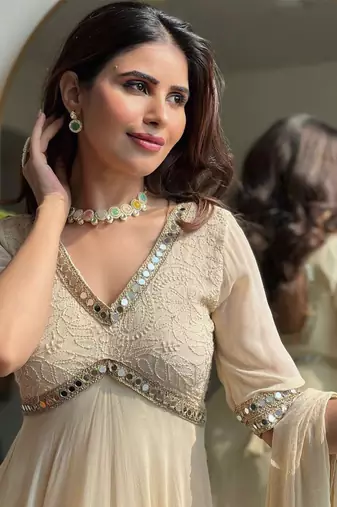 Cream mirror-work georgette Gown.