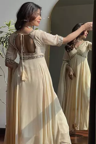 Cream mirror-work georgette Gown.