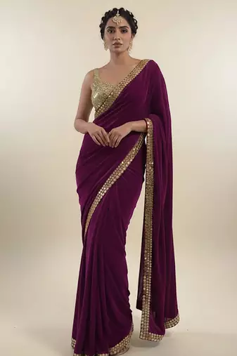 Purple embroidered velvet saree