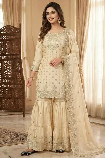 Chinon ivory mirror-work sharara suit