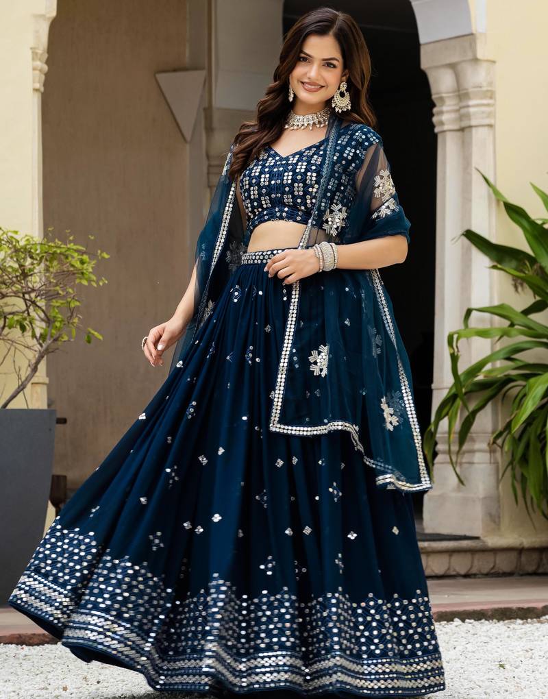 Fetching Teal zari, sequence heavy Embroidered Faux Georgette Indian wedding Designer lehenga choli