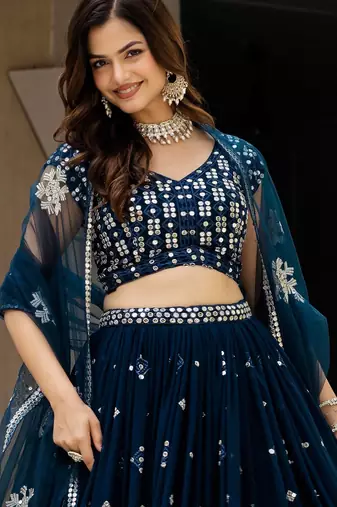 Fetching Teal zari, sequence heavy Embroidered Faux Georgette Indian wedding Designer lehenga choli