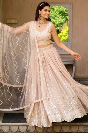 Glamourous Peach Zari and Sequins Embroidered Faux Georgette Indian wedding Designer lehenga choli