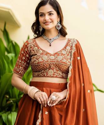 Appealing Rust Orange Zari and Sequins and Thread Embroidered Rangoli silk Indian wedding Designer lehenga choli 3