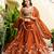 Appealing Rust Orange Zari and Sequins, and Thread Embroidered Rangoli silk Indian wedding Designer lehenga choli