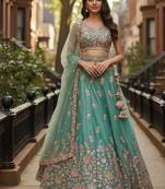Engaging Sea-Green Zari and Sequins, and Thread Embroidered Fendy Silk Indian wedding Designer lehenga choli