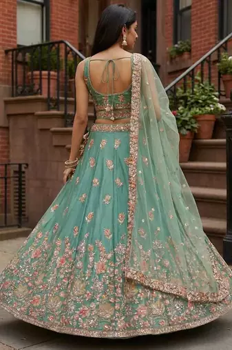 Engaging Sea-Green Zari and Sequins, and Thread Embroidered Fendy Silk Indian wedding Designer lehenga choli