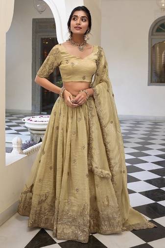 Dazzling Beige Zari and Sequins and Thread Embroidered Gold Crush Indian wedding Designer lehenga choli