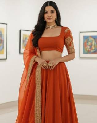Alluring Fenta Orange Zari and Sequins, and Thread Embroidered Faux Georgette Indian wedding Designer lehenga choli 2
