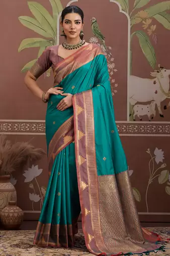 Peacock green tussar silk handloom weaving temple border saree